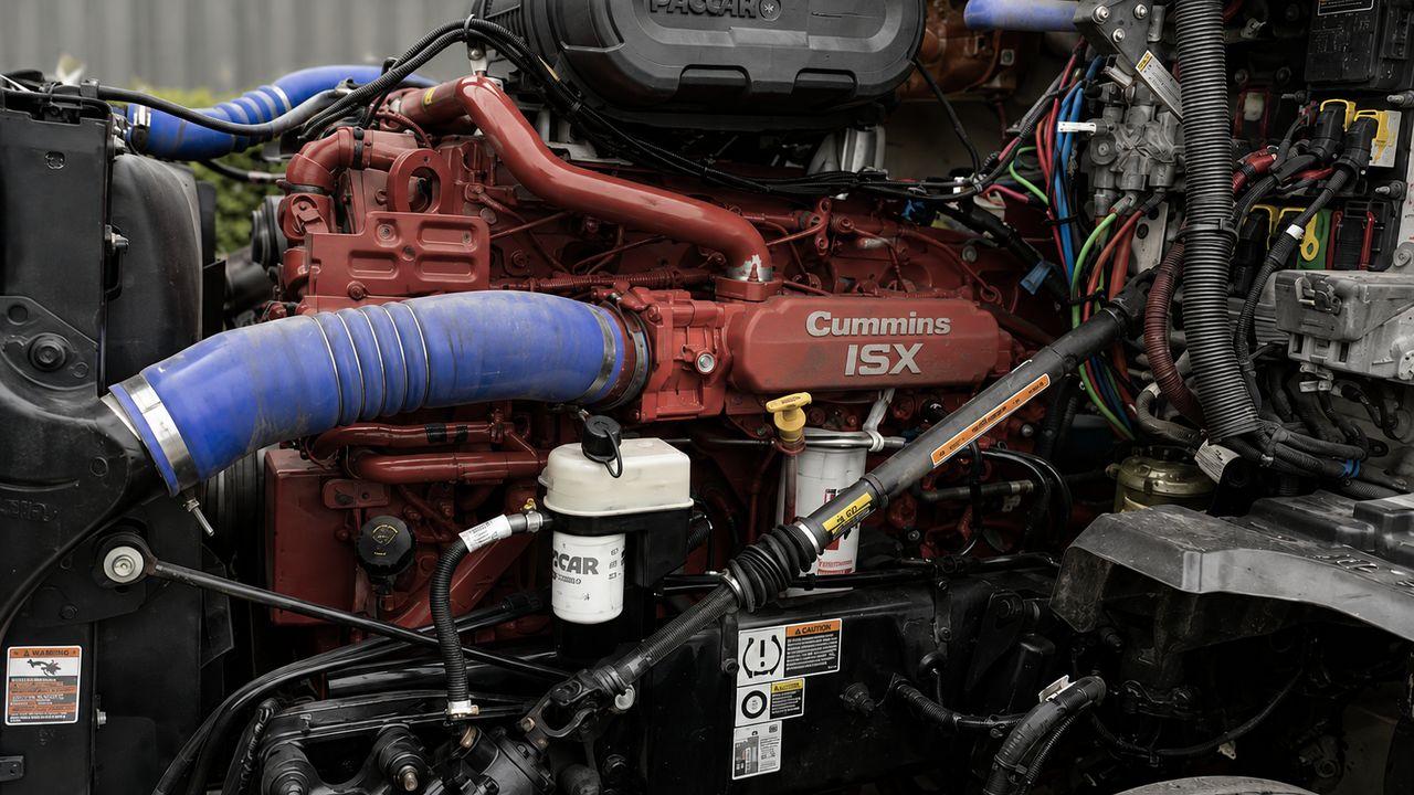 Cummins ISX front engine mounting plate — the $1,500 fix that prevents a $10,000 repair